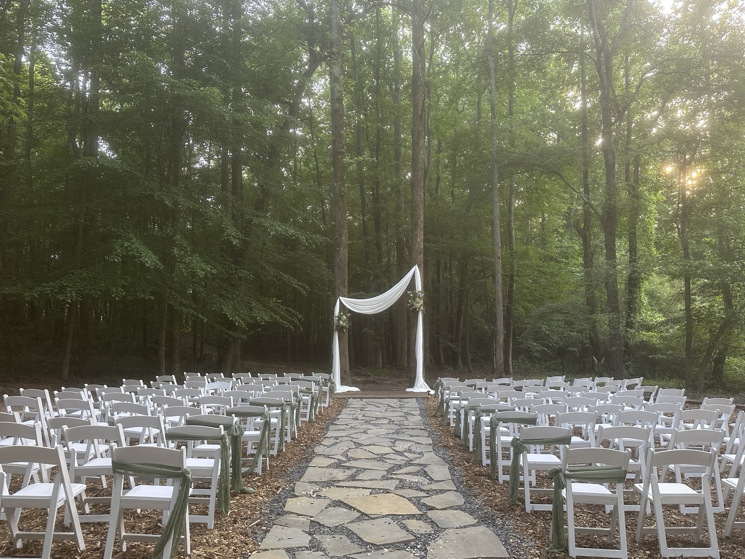 Woodland wedding ceremony arranged at the property